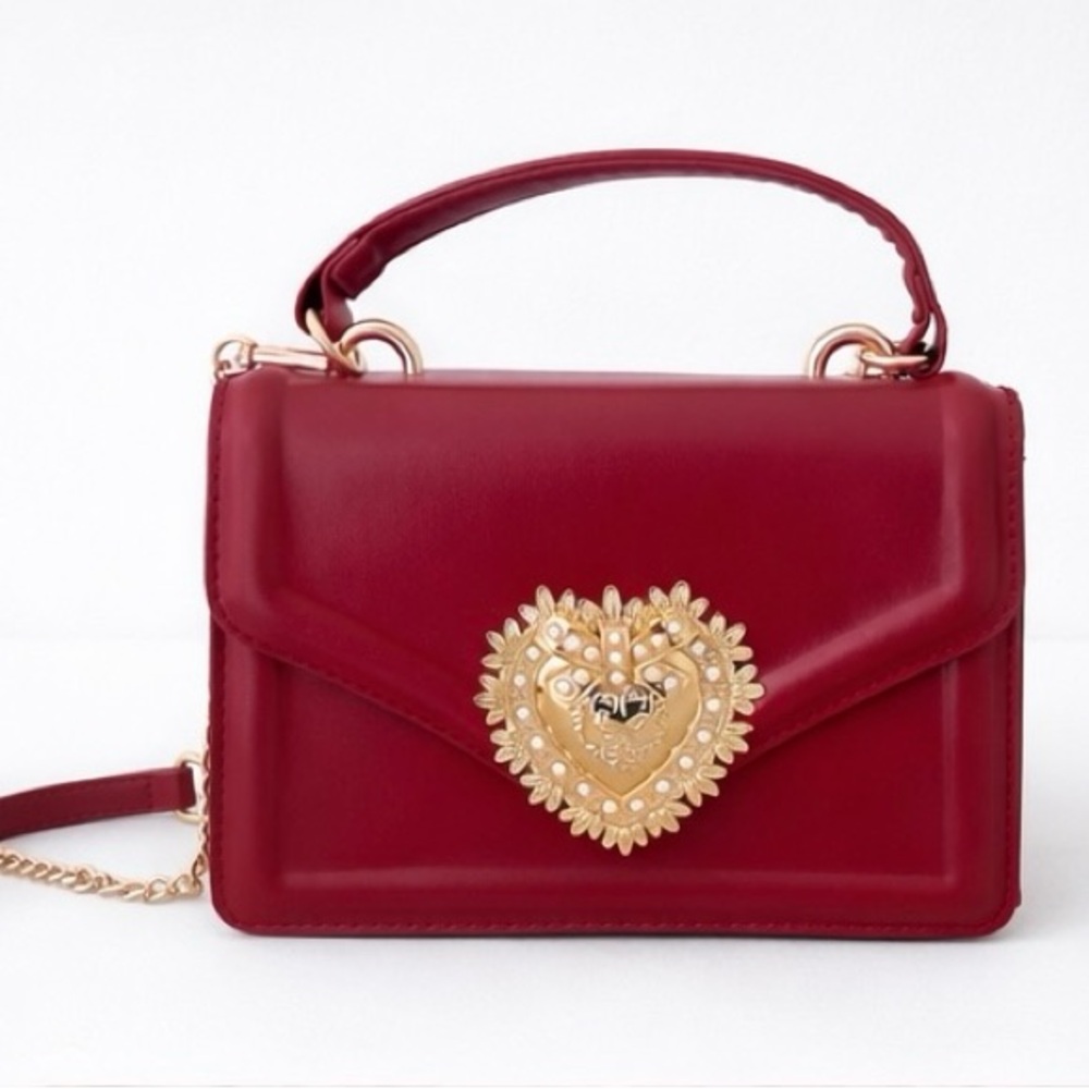 Elegant Red Handbag with Gold Heart Accent
